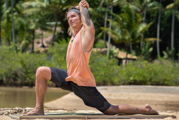 Male Yoga Teacher On Beach Brazil