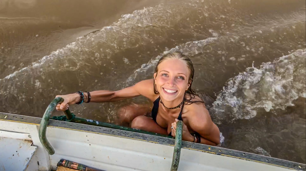 Juliana Semenova swimming in the Amazon in Peru